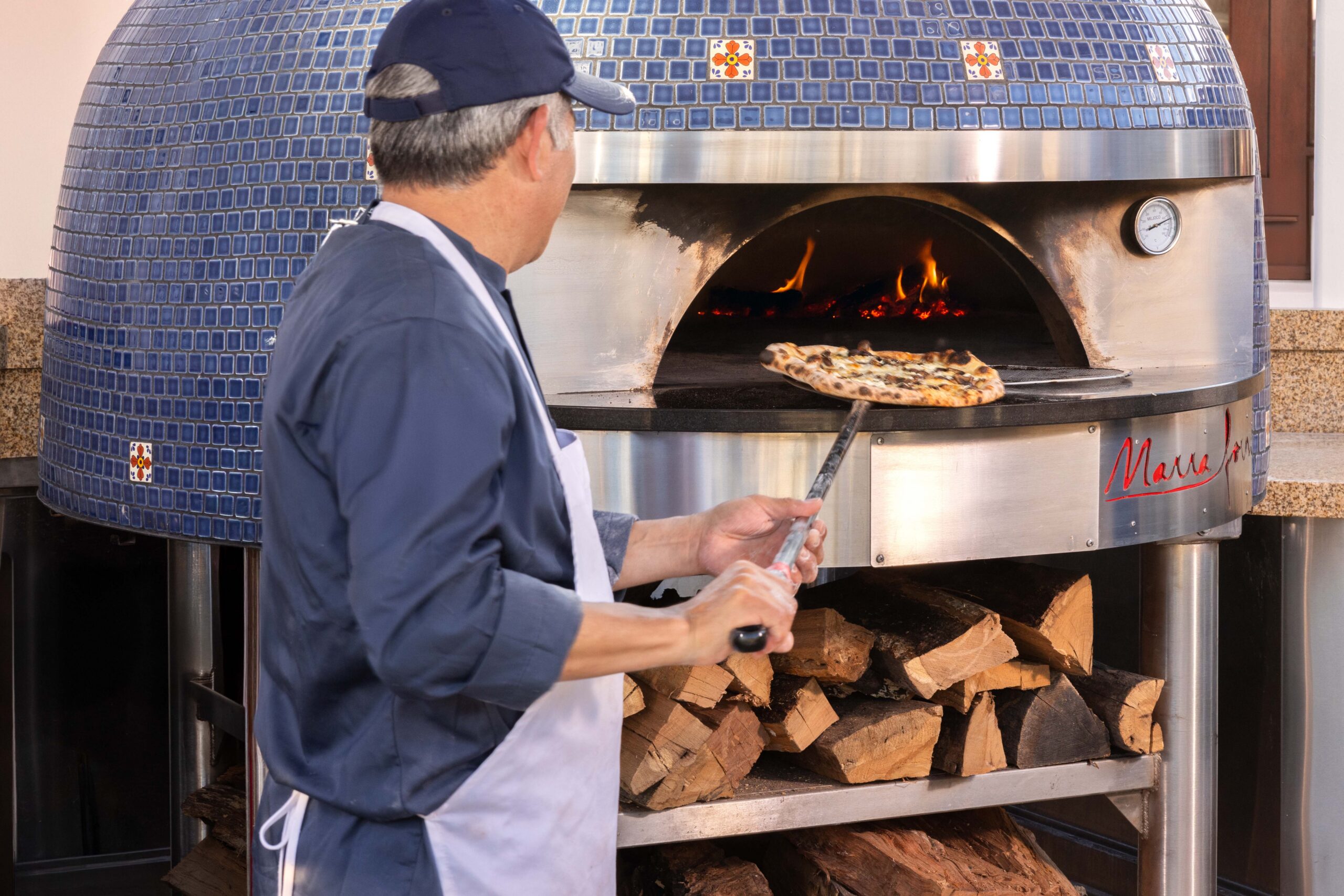 Woodfired pizza oven on the patio at La Jolla Beach and Tennis Club